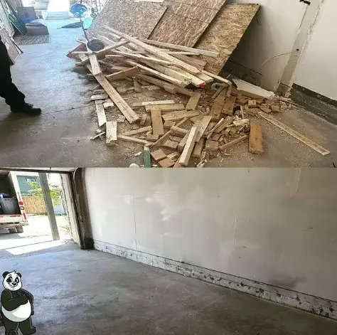 Garage floor covered in framing offcuts and sheeting, then swept clean