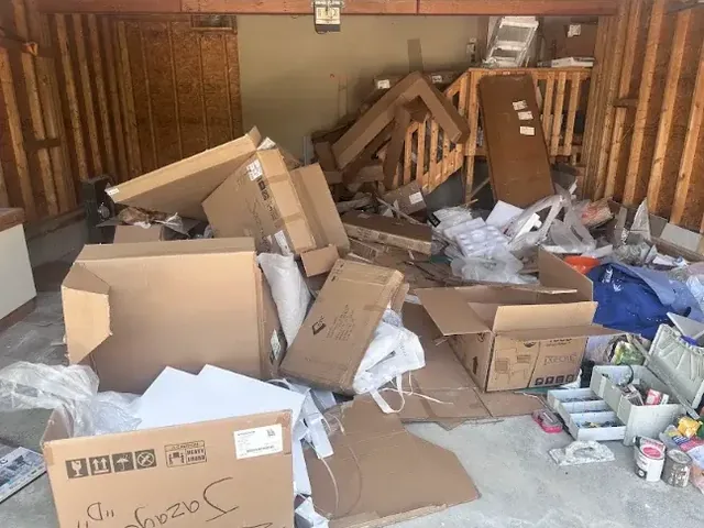 Before: Renovation packaging and offcuts cleared out of a double garage